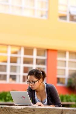 woman outside studying